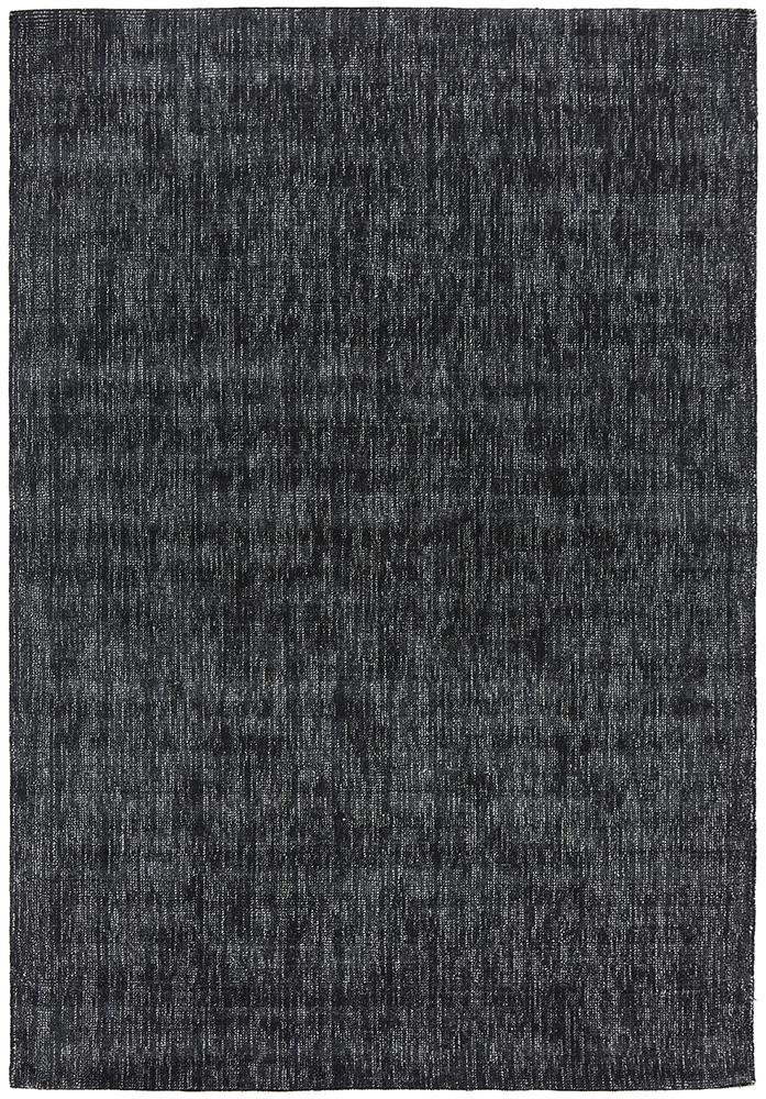 Black and ivory rug with tribal patterns