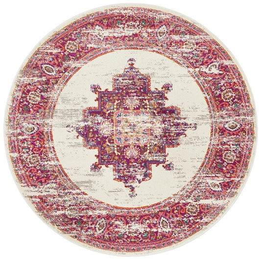 Pink round rug with plush texture