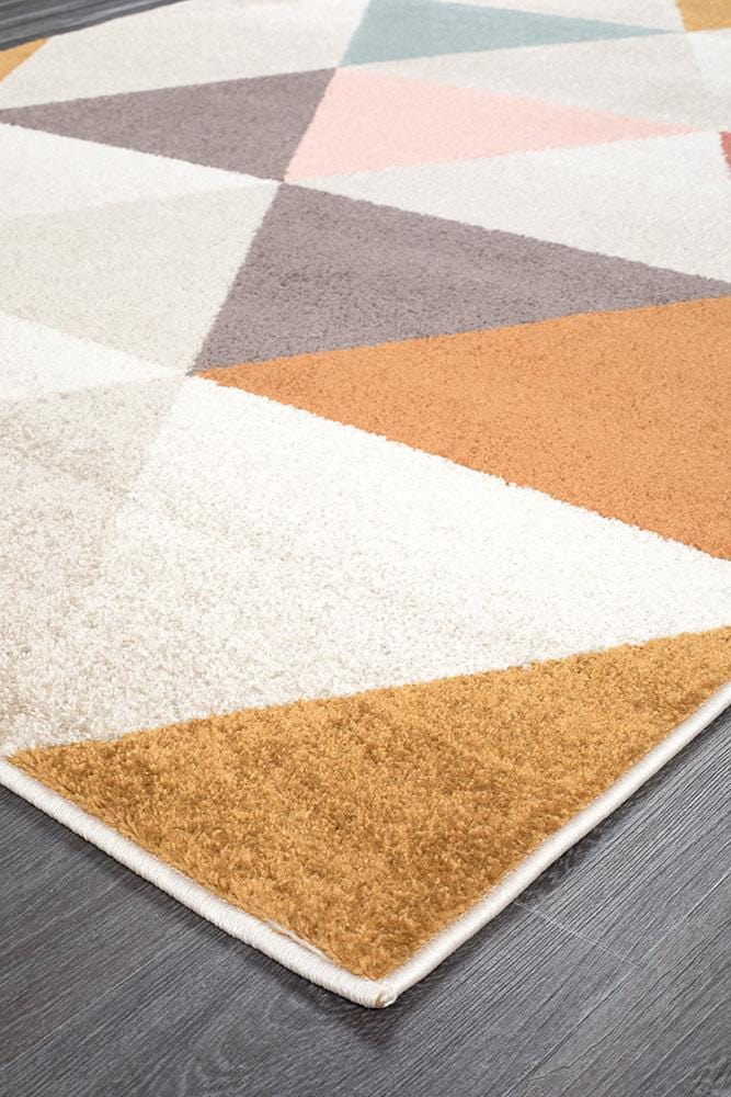 Dimensions in Triangle Blush Rug