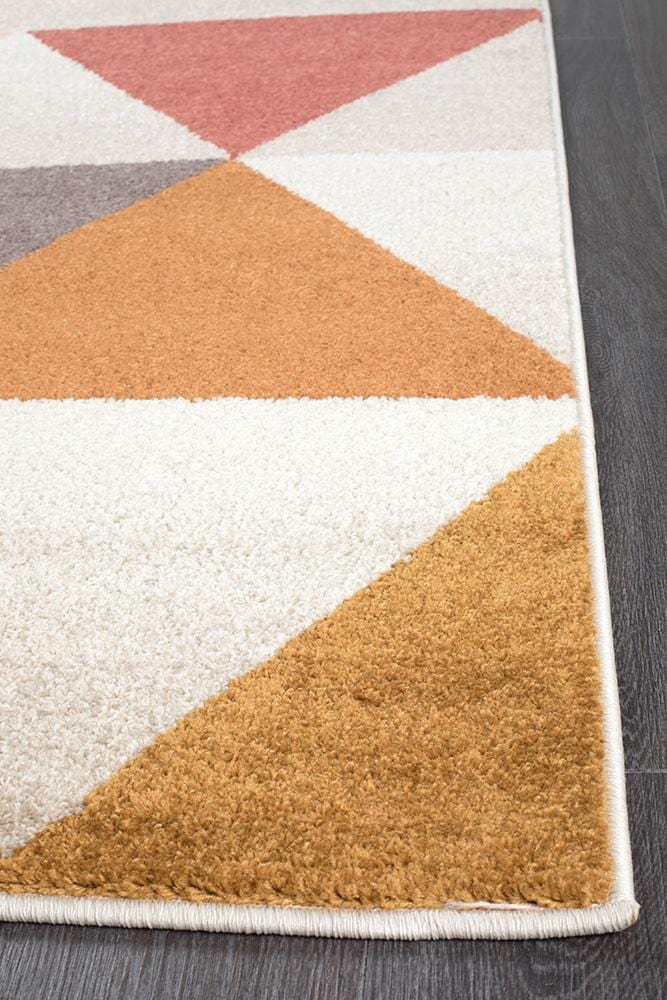 Dimensions in Triangle Blush Rug