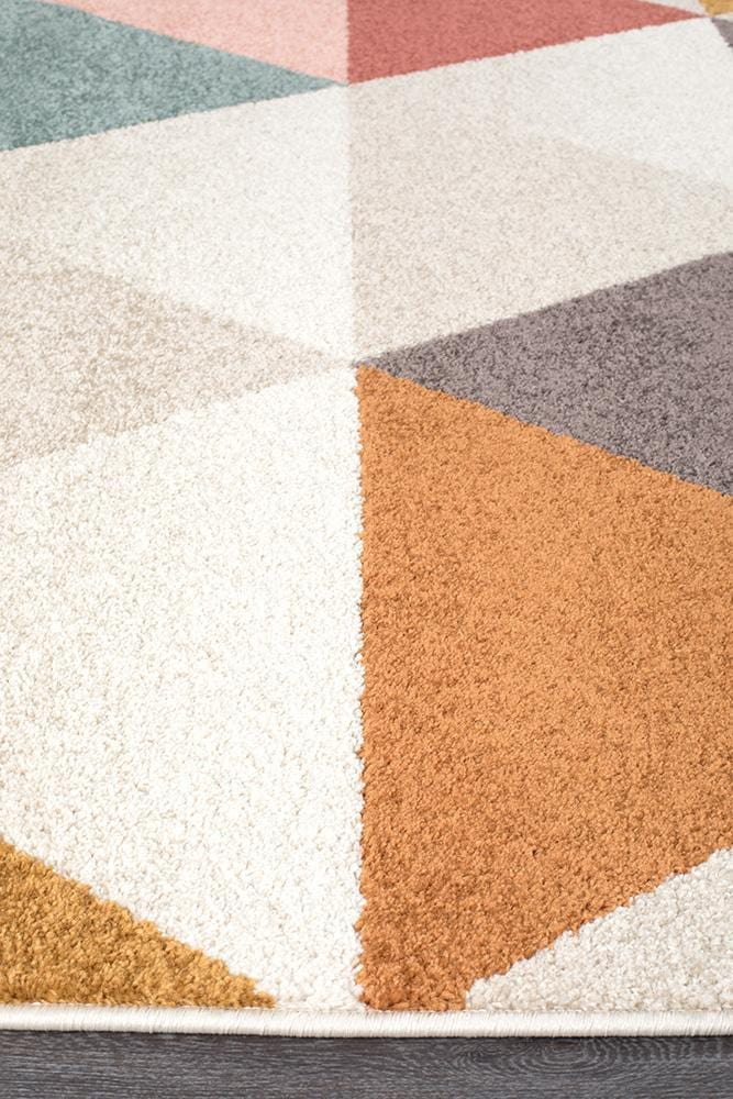 Dimensions in Triangle Blush Rug