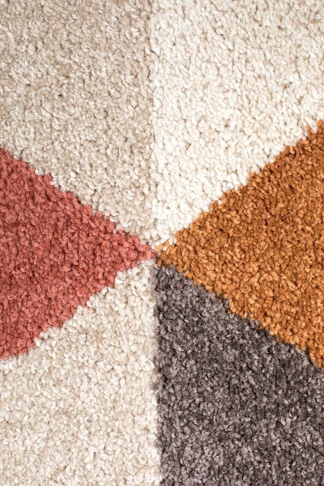 Dimensions in Triangle Blush Rug